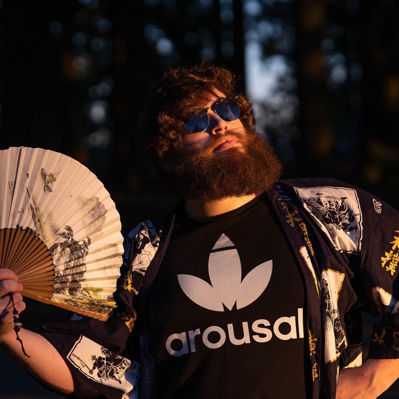 Rob Araujo with a folding fan