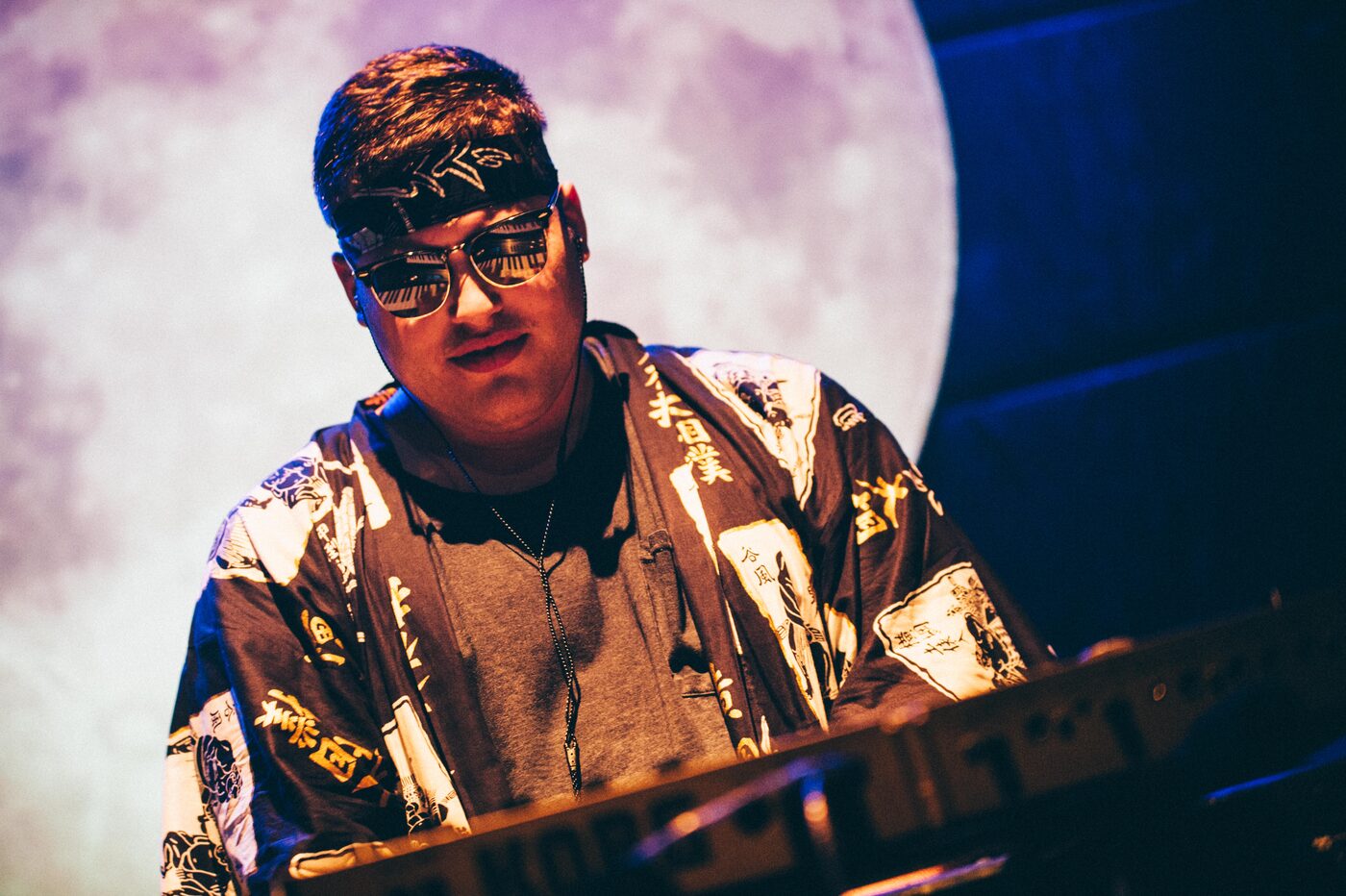 Rob Araujo on stage in sunglasses
