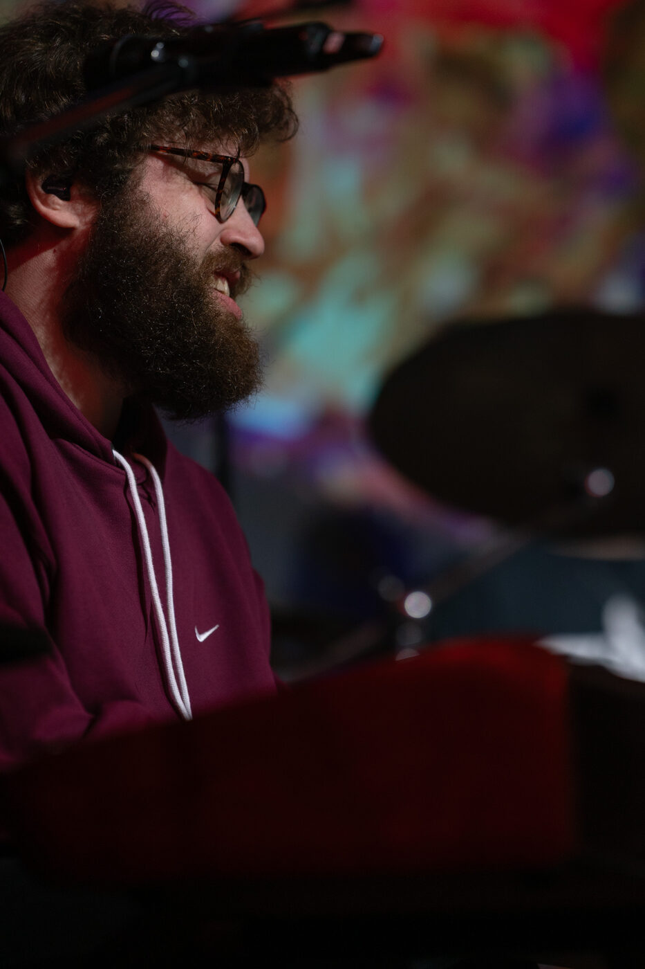 Rob Araujo smiling mid-performance