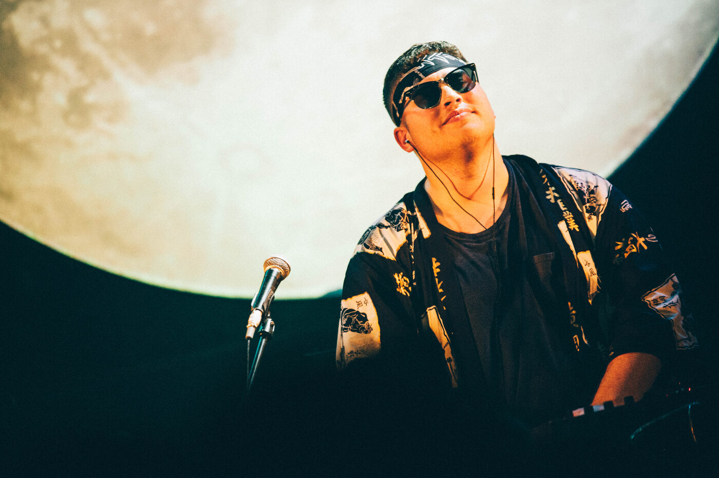 Rob Araujo on a moonlit stage