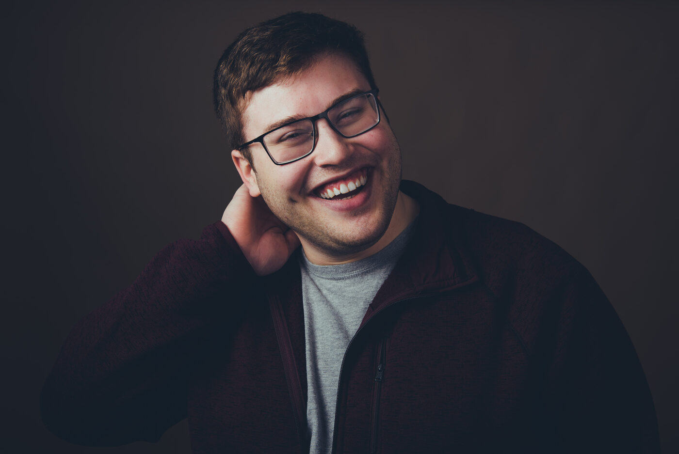 Studio portrait of Rob Araujo laughing